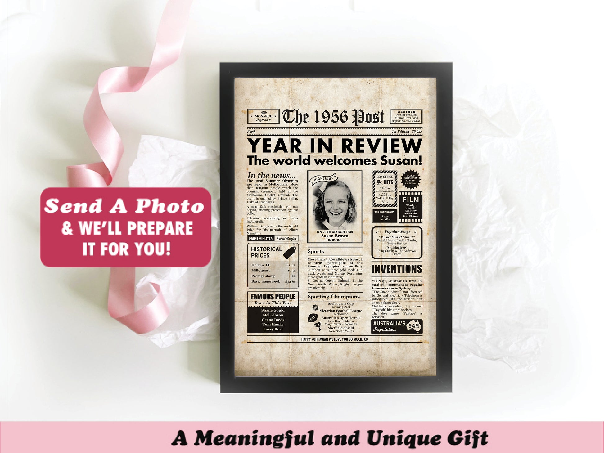 Customised 70th birthday newspaper poster, a unique gift, surrounded by pink ribbon and tissue paper.
