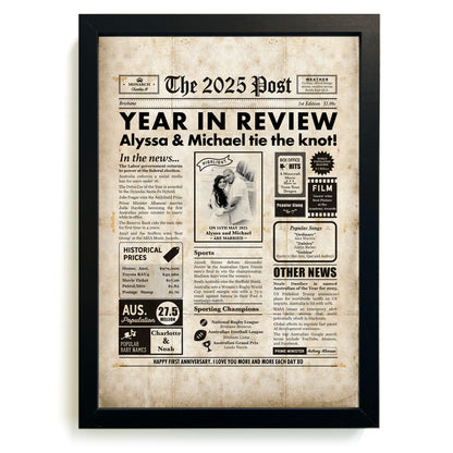 Framed paper anniversary print by Milestones Studio, designed like a newspaper with Personalised details in a black frame.